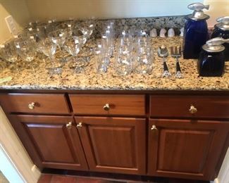 There are two of these granite top counters for sale