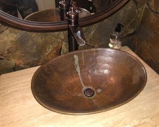 Another hammered copper bathroom sink