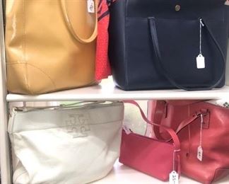 Numerous Tory Burch purses!