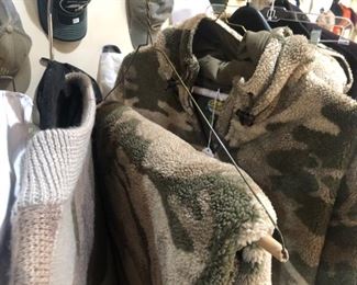 Rack full of men's camo clothing