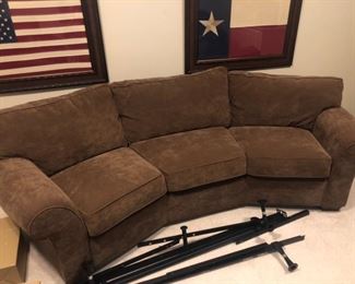 Angled 3-cushion sofa by Flexsteel in microfiber cover.