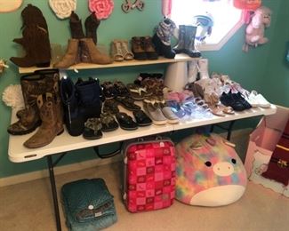 Lots of kids shoes and boots