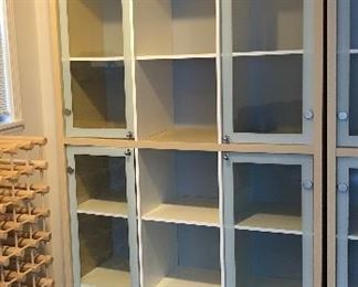 IKEA display cabinet (bookshelf) - one of 4 alike for sale. With 4 glass doors, open at center. (40.75”W, 16”D, 83”H including removable metal legs)