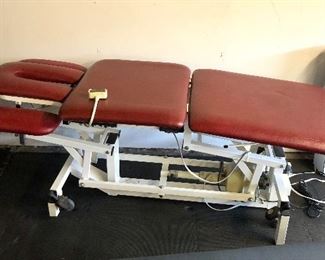 Adjustable electric physical therapy table - made by Huntleigh Akron, U.K. (Height is adjustable, 27”W, 75”L)