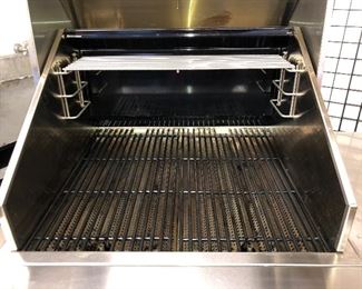 Cooking surface of grill is 23” x 23”