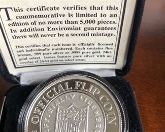 Official flip coin from the first Tennessee (Oilers) Titans game in 1997