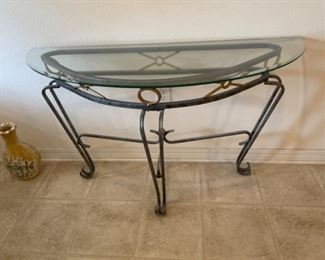 Iron and glass entry/sofa table.                        48”w 18” d 28.25” t.                                                $120.00