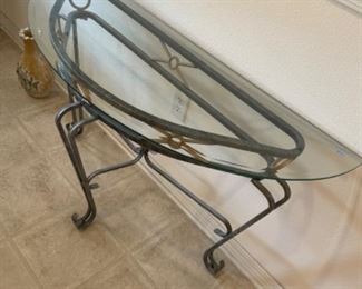 Iron and glass entry/sofa table.                        48”w 18” d 28.25” t.                                                $120.00