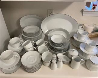 Nora take “Reina” China service for 6.  71 pieces 2 platters, 2 serving bowls, salt & pepper, sugar & creamer, 12 cups and saucers.                                                             $225.00
