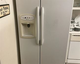 Maytag side by side refrigerator 2005 with water and ice in the door. ( Does have a cracked selection plate)                     $300.00