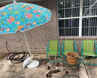 Patio umbrella and beach chairs