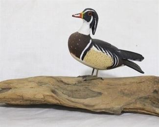 81 - Carved & painted mini wood duck on stand McDowell's signed & dated 1977 10 x 6, size of base
