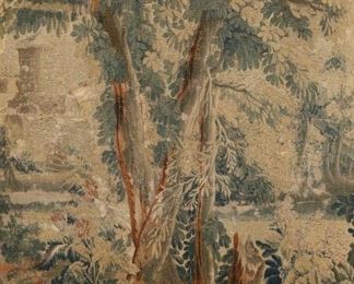 14	Flemish Verdure Tapestry	Large woven wool and silk Flemish garden tapestry. Visible in frame 84 1/4" x 54 3/8" (with frame 89" x 61"). Wear, fading and holes throughout. Later stretcher and gilt frame.
