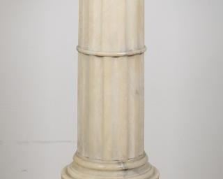 26	Neoclassic Style Marble Column Pedestal	"Neoclassical style marble column pedestal or sculpture plinth. 20th century. White Italian marble with blue veins, fluted Doric column form. Assembles from 7 pieces. Scratches and marks to top of pedestal, Chips and small losses to marble throughout edges of pedestal, especially around lowest edge of octagonal base.

13 3/4"" W x 13 3/4"" D 

"
