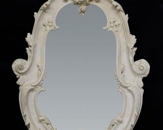 27	Italian Style Carved Alabaster Mirror	"Italian style carved alabaster mirror. Carved bird pediment over scrolling frame. Beveled mirror. Chip to carved scroll on left side of mirror. Small fleabites to edges of top carvings near top left flower. 

55"" x 36 1/4""

Provenance: Nadeau's Auction Gallery, Lot 680, January 1st, 2023. From the collection of a prominent Connecticut family."

