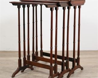 37	Set of Three Regency Nesting Quartetto Tables	"Set of three Regency nesting quartetto tables. Circa 1830. Rosewood, colonnade form legs, satinwood-banded inlays to tops. Wear, scuffs, water damage, and scratches to wood of all three table tops. Losses to veneer on edges of first and second largest tables. Small protrusion to molding on top of second largest table. Nicks and chips to wood on edges of arch legs and feet of tables. Wear to wood throughout all tables. 

19 7/8"" W x 11 7/8"" D x 28 3/4"" 

Provenance: Christie's Interiors, Lot 486, October 2nd, 2009. From the collection of a prominent Connecticut family."
