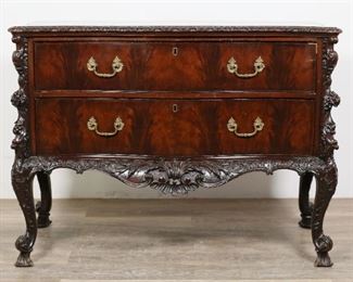 38	Rococo Revival Mahogany Chest of Drawers	"Rococo Revival mahogany chest of drawers. Continental, 19th century. Serpentine form, ornate mahogany carvings, two burled drawers. Scuffs, scratches and wear to wood throughout top of chest. Marks, nicks, and scratches to wood on left and right sides of chest. Losses to wood on carved molding of top and to carvings of feet. Losses to molding on upper right corner of top drawer front. From the collection of a prominent Connecticut family.

45 5/8"" W x 21 3/4"" D x 33 3/8"" H"
