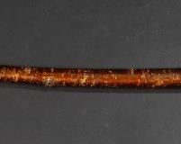 50	Japanese Sword Cane Shikomizue	19th Century bark and wood walking stick with concealed sword. Walking stick with metal tip. Handle top with hole for lanyard.  Metal at bottom of the cane is rusted and pitted. Minor pitting and the blade. Tang is signed. 35 1/2" tall. From the collection of a prominent Connecticut family.
