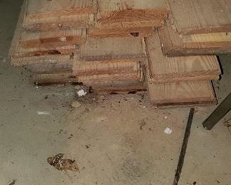 Various stacks of recovered & unused wood.