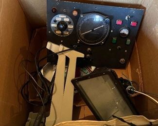 Many vintage electronic items.