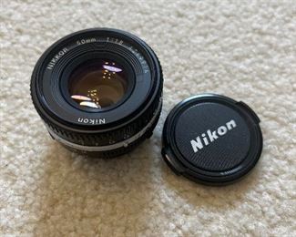 (1) Nikon Nikkor 50mm f/1.8 Lens w/ Caps 