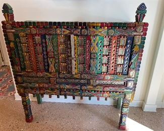 Green folk art cabinet