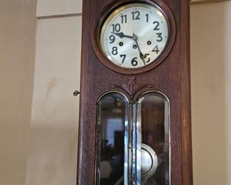 Mahogany pendulum wall clock with key