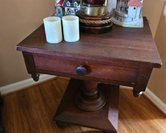 Empire mahogany pedestal table with drawer