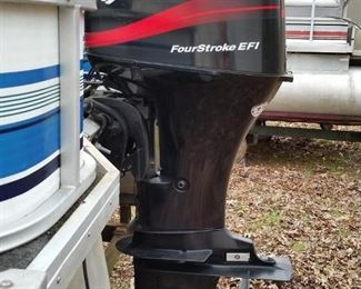 The Play Craft's outboard is a 2002 Mercury 60hp ELPTEFI (4-stroke)