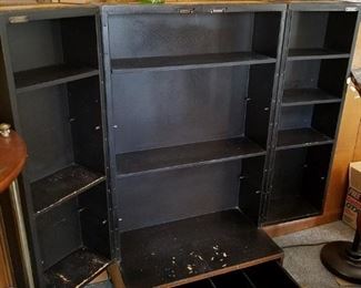 The cabinet with the doors and drawer opened