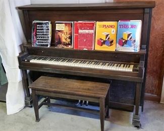 Upright piano and many music books