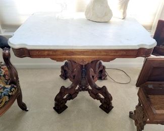 Antique carved wood side table with marble top