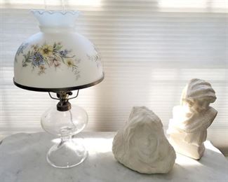 Converted oil lamp, carved stone female busts
