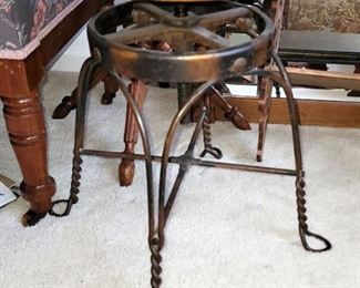 Antique twisted iron piano stool
