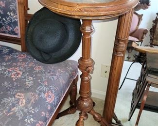 Antique carved wood plant stand