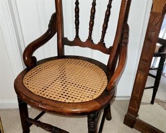 Antique carved wood cane seat chair