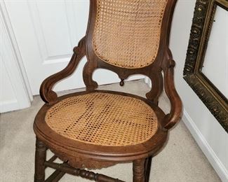 Antique carved wood cane seat chair
