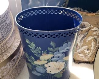 Painted blue metal garbage can