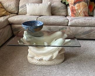 Dolphin base coffee table with beveled glass top