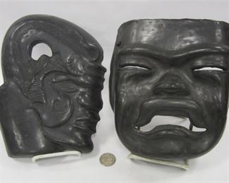 TWO OAXACA BLACK POTTERY MASKS