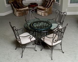Round glass table with metal base