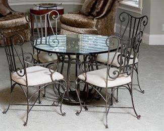 Round glass table with metal base