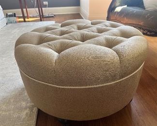 Champagne upholstered ottoman