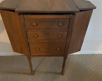 Vintage Martha Washington sewing cabinet with accessories.  Very nice condition for its age. 