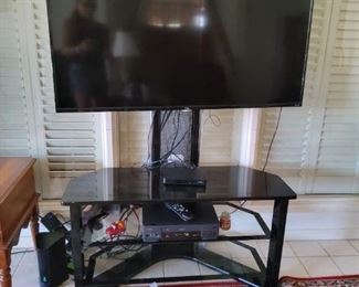 TV and stand in good working condition