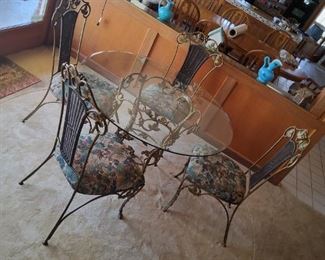 Glass table with four chairs excellent condition