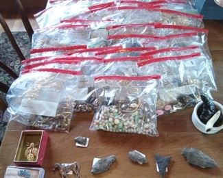 Bags of jewelry and arrowheads