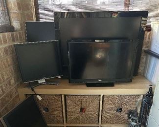 Monitors, small paper shredder, camera trio-pods