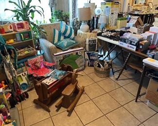 Lounge chair, children's kitchen set, wooden rocking cradle and chair, lamps, gaming console