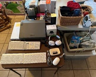Keyboards, typewriter, headphones, computer accessories, storage bags